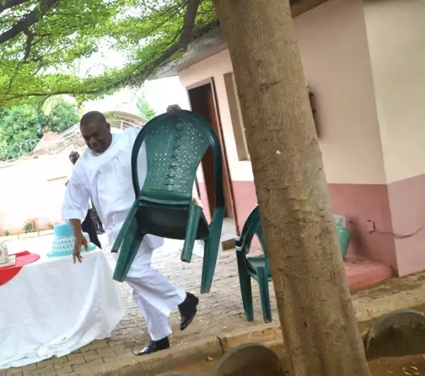 Billionaire & Ex-Governor Orji Uzor Kalu Spotted Arranging Plastic Chairs At An Event [See Photos]